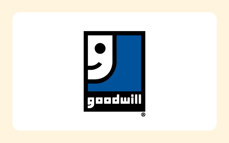 Goodwill logo, a blue square with a white smiling face and the word 