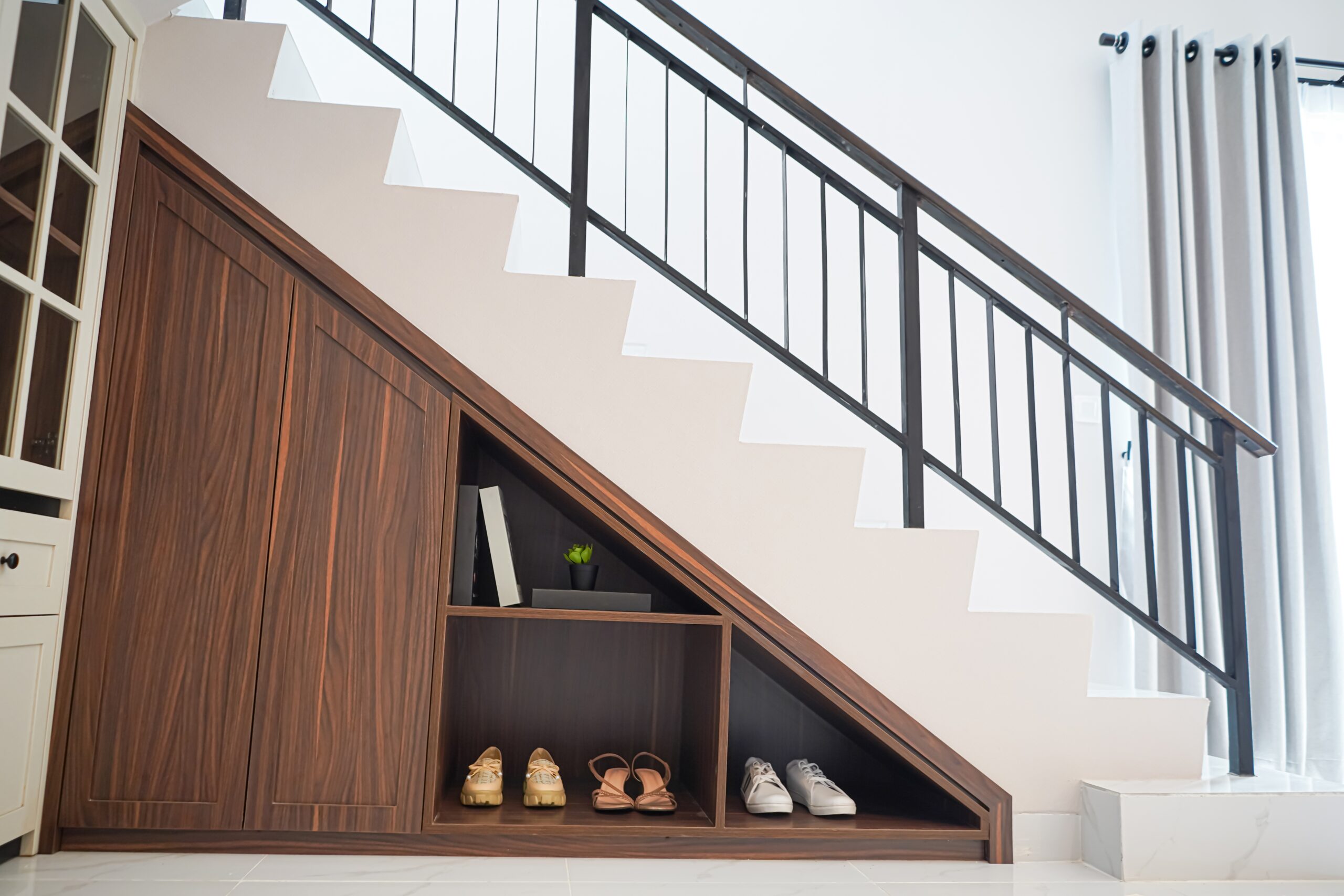 entryway organization under stairs