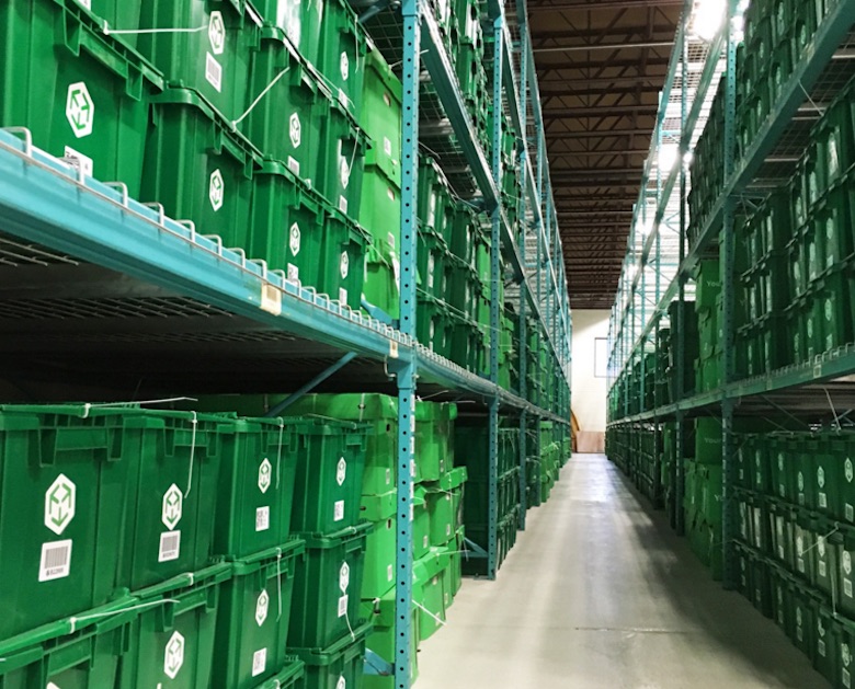 Bins of stored items stack up in one of a warehouse operated by full-service operator MakeSpace.