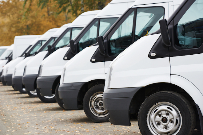 Commercial fleet vehicles parked and lined up